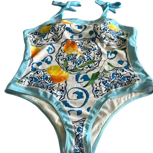 One piece swim suit XXL lemon print.New never worn still has liner .